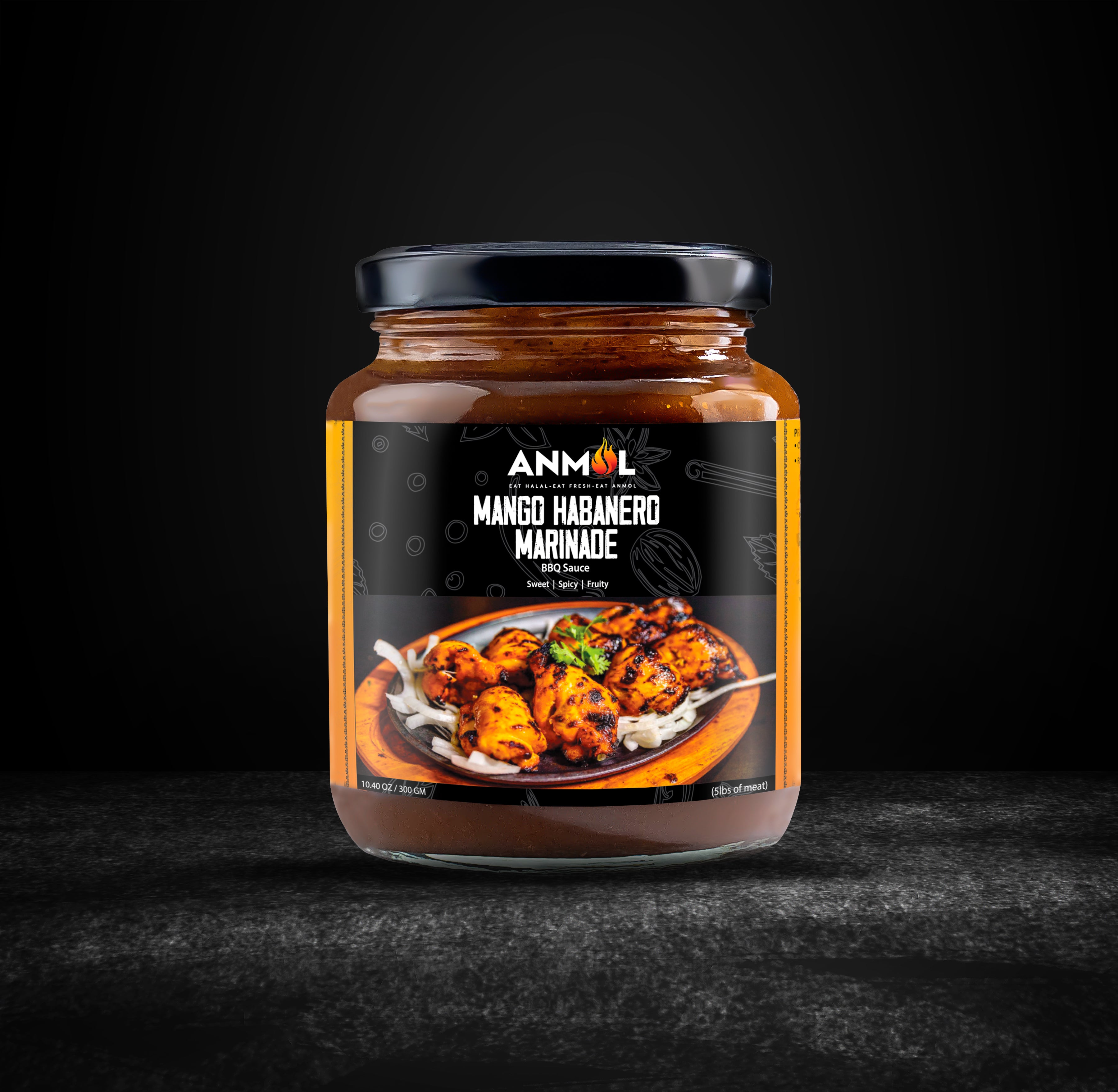 mango habanero marinade jar black background