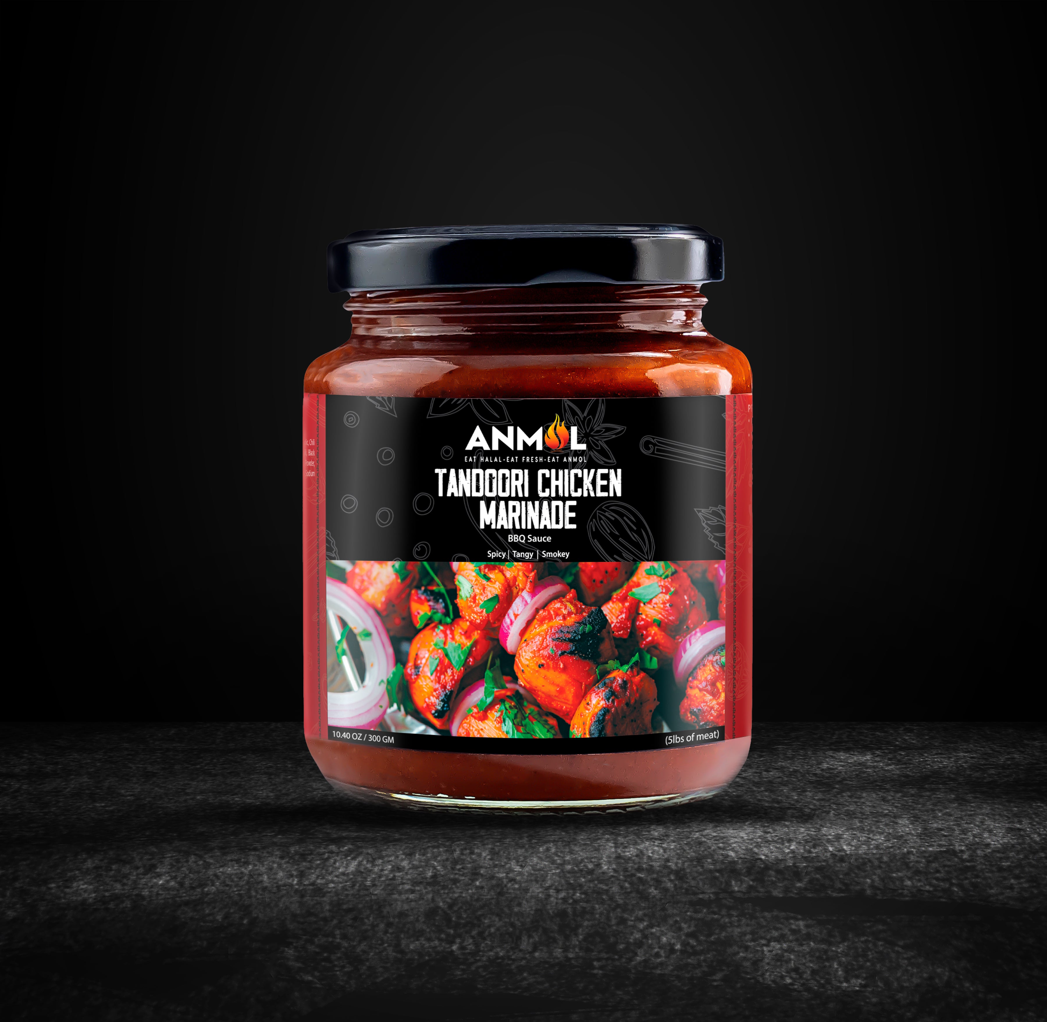 tandoori chicken marinade jar black background